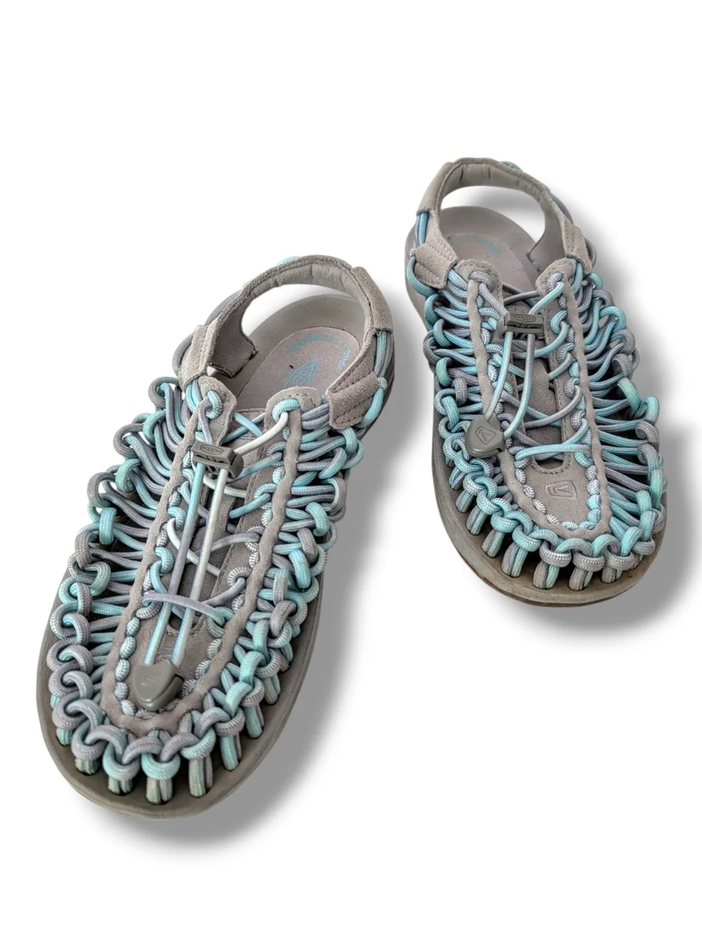 NWOT KEEN Women's Uneek open-air cord sandals in a grey and aqua blue colorway